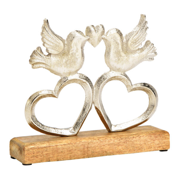 Pájaro de pie sobre corazón, sobre base de madera de mango, fabricado en metal plateado (An./Al./Pr.) 20x17x5cm