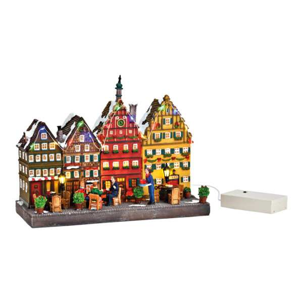 Casas adosadas con escena invernal con luz LED, hechas de policarbonato de colores (ancho x alto x profundidad) 26 x 20 x 11 cm, funcionamiento con pilas 3 x AA no incluidas